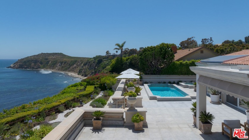 Experience palatial elegance and abundant natural light in this - Beach Home for sale in Malibu, California on Beachhouse.com
