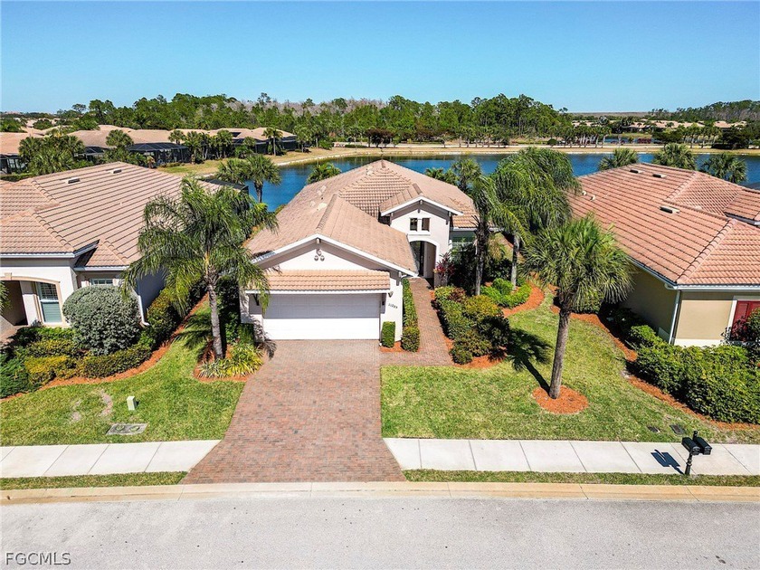 This gorgeous Florencia design, built by WCI, Pelican Preserve's - Beach Home for sale in Fort Myers, Florida on Beachhouse.com