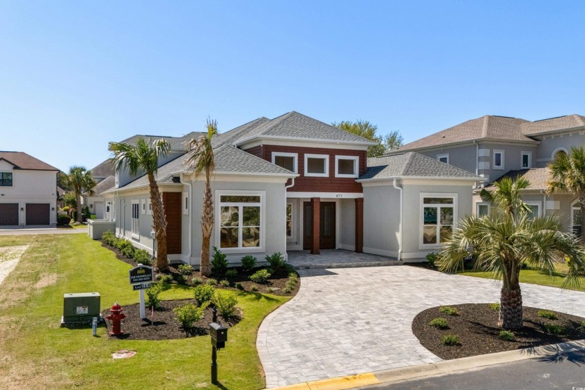 Discover unparalleled luxury living at 877 Bluffview Drive - Beach Home for sale in Myrtle Beach, South Carolina on Beachhouse.com