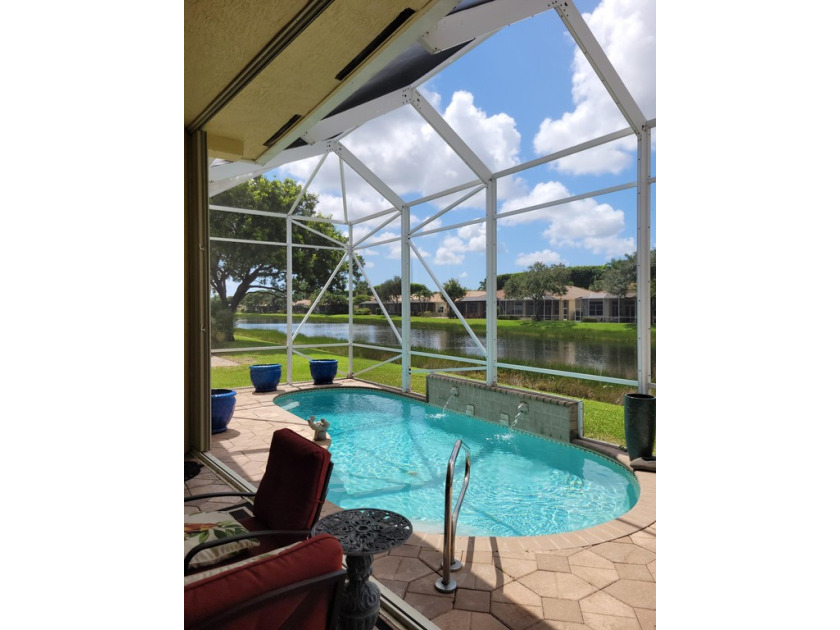 Public Remarks:This LAKEFRONT, 3 bed 3.5 bath + office POOL home - Beach Home for sale in Wellington, Florida on Beachhouse.com