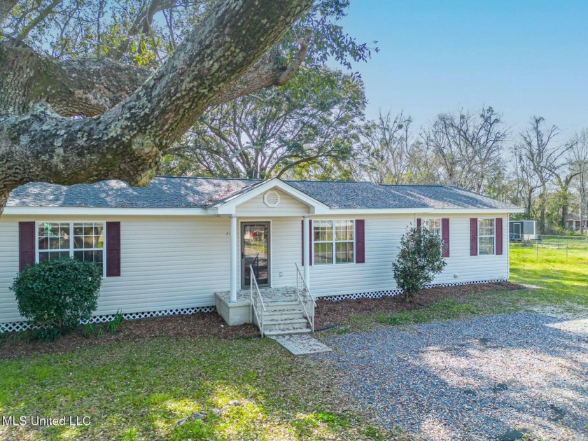 Charming Coastal Home with Brand-New Roof and Spacious - Beach Home for sale in Long Beach, Mississippi on Beachhouse.com