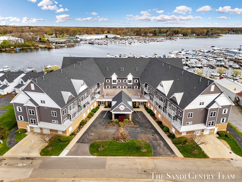 Step into easy lakeside living in this move-in-ready 1,300sq ft - Beach Condo for sale in Spring Lake, Michigan on Beachhouse.com