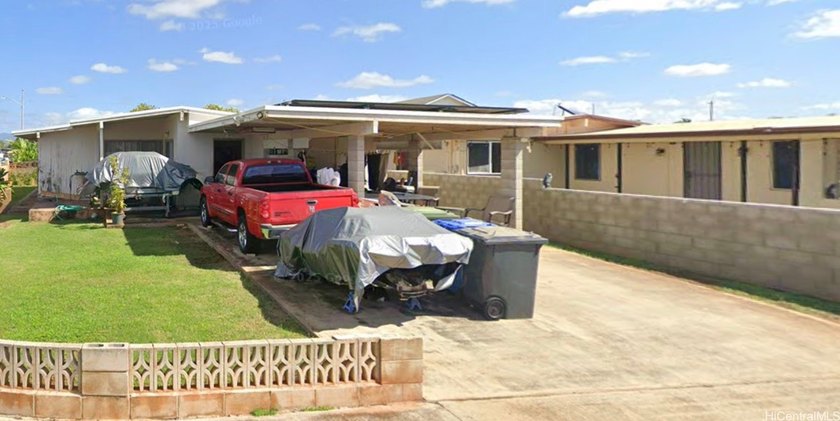 Corner lot home in average condition with great potential of - Beach Home for sale in Ewa Beach, Hawaii on Beachhouse.com