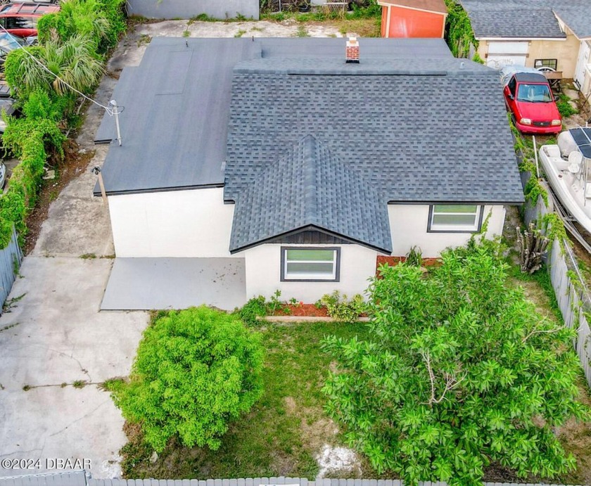 This stunning 3-bedroom 2-bathroom home is completely remodeled - Beach Home for sale in Daytona Beach, Florida on Beachhouse.com