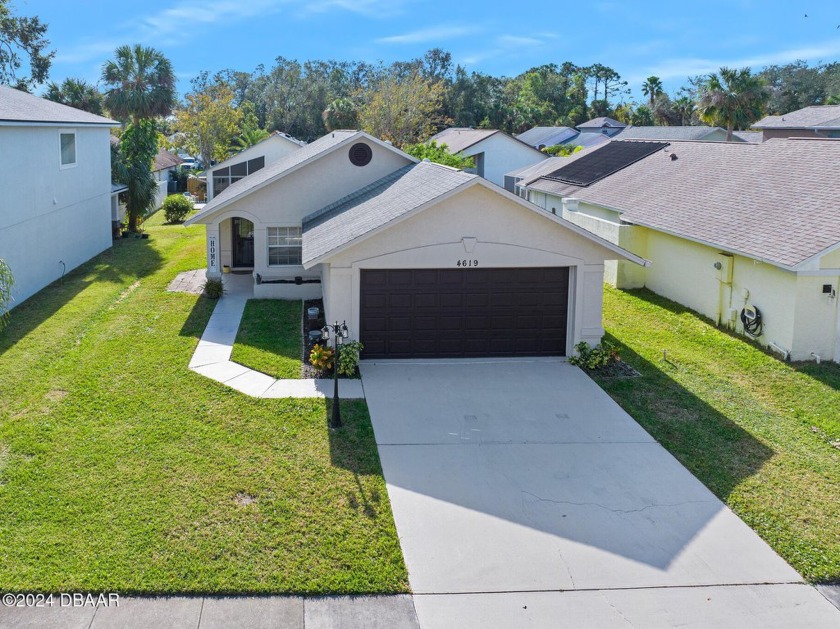 Serene residential street. As you step inside, you'll be greeted - Beach Home for sale in Port Orange, Florida on Beachhouse.com