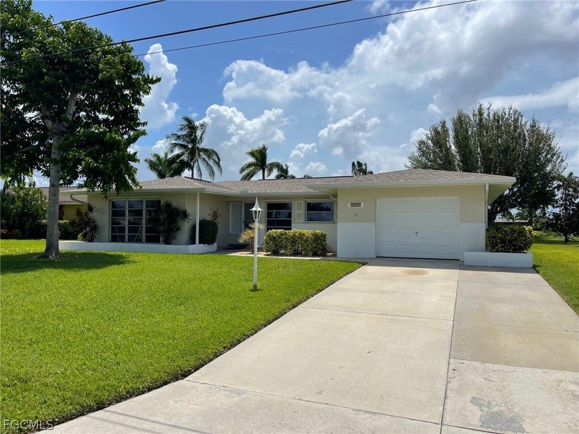Charming 3-Bedroom, 2-Bathroom Pool Home on Gulf Access Canal - - Beach Home for sale in Cape Coral, Florida on Beachhouse.com