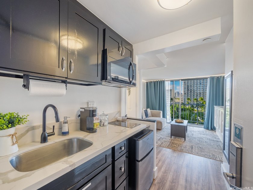 Experience the best of island living at Pacific Monarch, ideally - Beach Condo for sale in Honolulu, Hawaii on Beachhouse.com