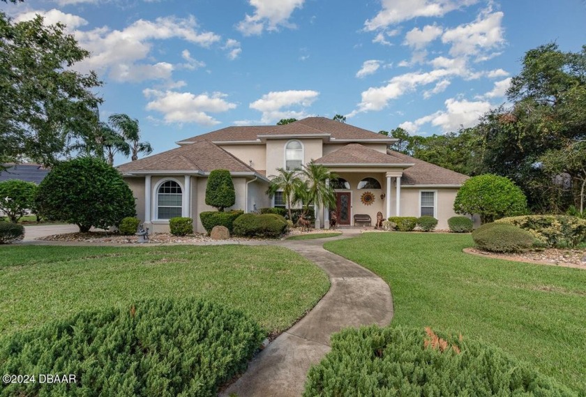 Custom-built-5 bedroom, 4.5-bath estate home in the desirable - Beach Home for sale in Ormond Beach, Florida on Beachhouse.com