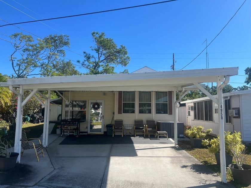 This Corner Lot 2 Bedroom, 2 Bath FULLY FURNISHED  Home is in - Beach Home for sale in Holiday, Florida on Beachhouse.com