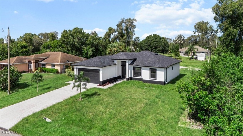 Welcome to 312 Ranch Ave, Lehigh Acres! This stunning new - Beach Home for sale in Lehigh Acres, Florida on Beachhouse.com