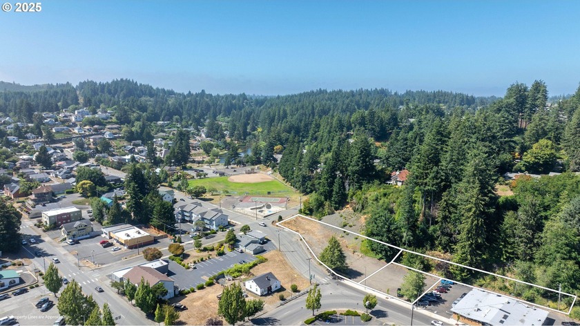 1.39 +/- ACRES OF MIXED USE ZONING AVAILABLE RIGHT IN THE HEART - Beach Lot for sale in Coos Bay, Oregon on Beachhouse.com