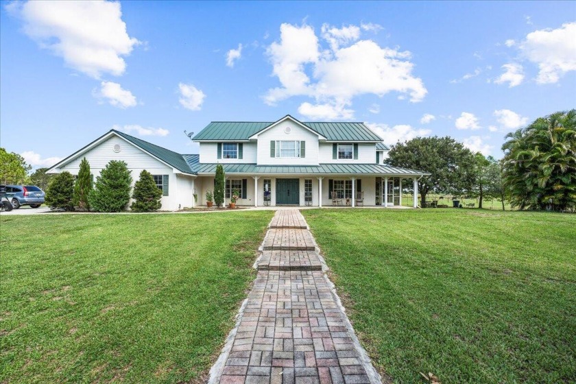 FLY HOME TO WHERE COUNTRY LIVING MEETS THE SKY!!  This beautiful - Beach Home for sale in Port Saint Lucie, Florida on Beachhouse.com