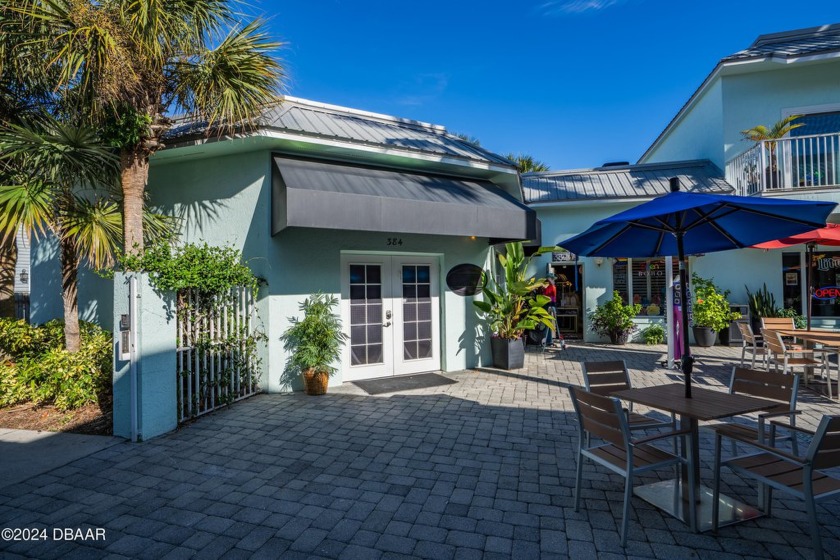 This corner unit commercial property at 384 Flagler Ave in The - Beach Commercial for sale in New Smyrna Beach, Florida on Beachhouse.com