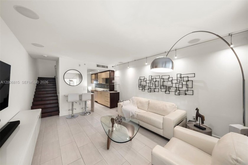Live the South Beach lifestyle in this sleek two-story 1-bed, 1 - Beach Townhome/Townhouse for sale in Miami Beach, Florida on Beachhouse.com