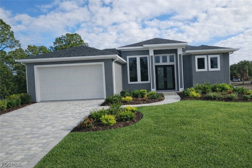 Beautiful single-family home under construction and available - Beach Home for sale in Lehigh Acres, Florida on Beachhouse.com