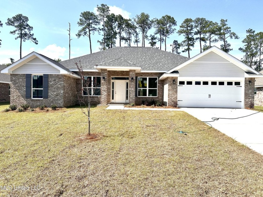 Stunning 4-Bedroom Home in Prestigious Lake & Pool Community! - Beach Home for sale in Biloxi, Mississippi on Beachhouse.com
