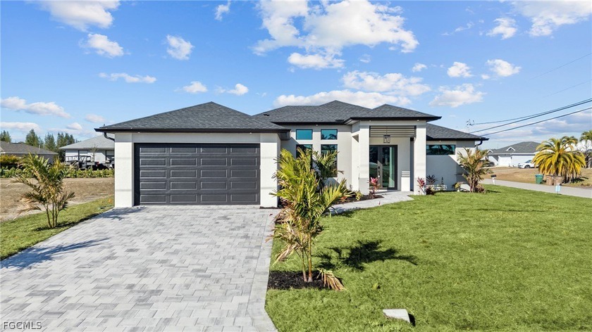 Welcome to this stunning NEW CONSTRUCTION beauty in Cape Coral - Beach Home for sale in Cape Coral, Florida on Beachhouse.com