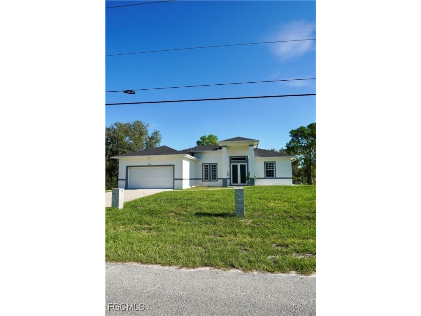 Discover modern elegance in this brand-new 4-bedroom, 3-bath - Beach Home for sale in Lehigh Acres, Florida on Beachhouse.com