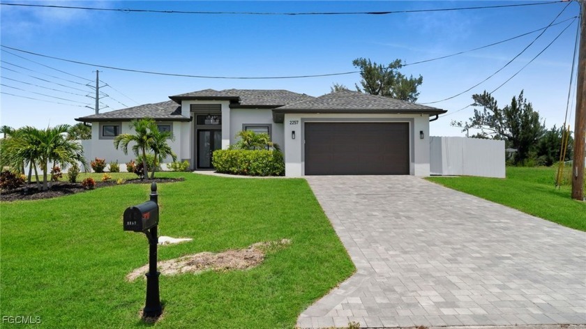 ASSESSMENTS PAID & NO FLOOD ZONE CANAL HOME! 2023 Home with - Beach Home for sale in Cape Coral, Florida on Beachhouse.com