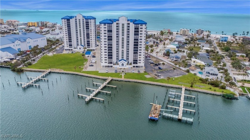 Experience breathtaking views of both the Gulf and Bay from two - Beach Condo for sale in Fort Myers Beach, Florida on Beachhouse.com