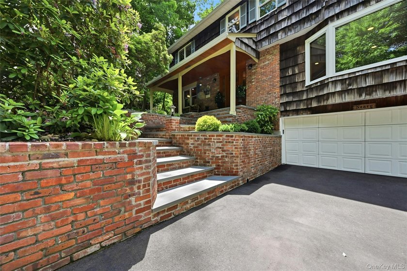 SEASONAL SERENITY. The house that welcomes you in, that you - Beach Home for sale in Northport, New York on Beachhouse.com