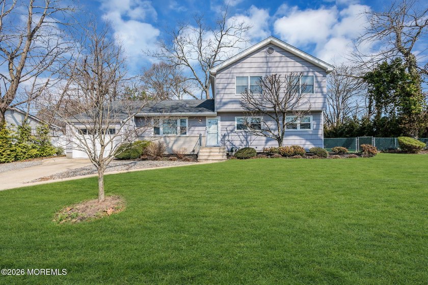 Nestled in the heart of Oakhurst, this expanded ranch offers the - Beach Home for sale in Oakhurst, New Jersey on Beachhouse.com