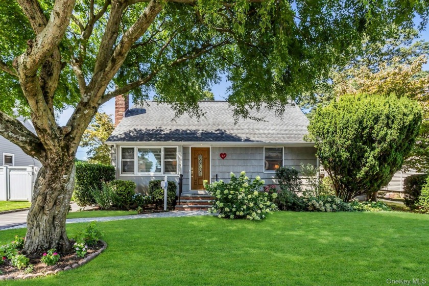 Charming Cape Cod Home situated on desirable tree-lined street - Beach Home for sale in Glen Cove, New York on Beachhouse.com