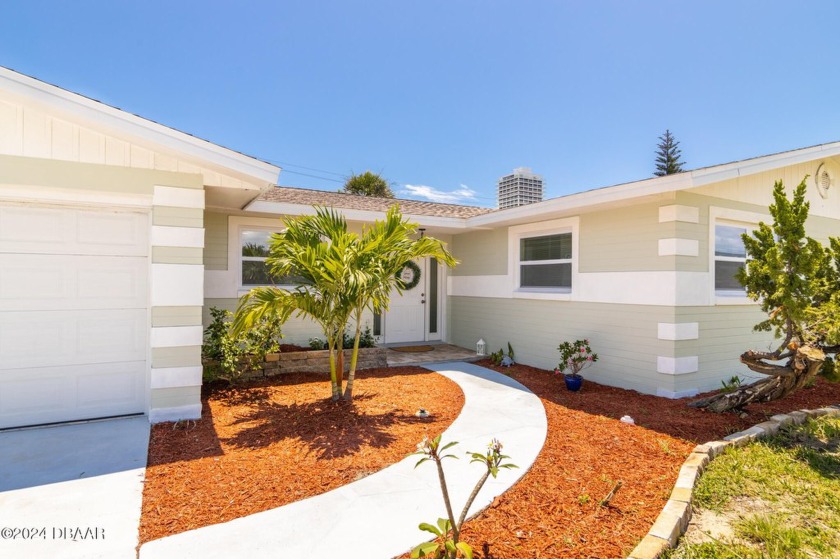 This stunning, FULLY RENOVATED 4-bed, 2-bath home is perfectly - Beach Home for sale in Ormond Beach, Florida on Beachhouse.com