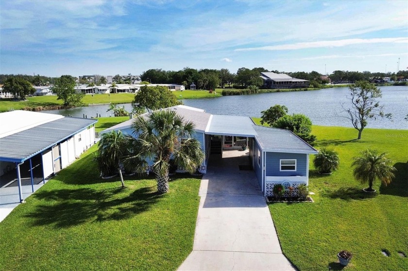 Dreaming of living on Nature Lake in Tidevue Estates now is the - Beach Home for sale in Ellenton, Florida on Beachhouse.com