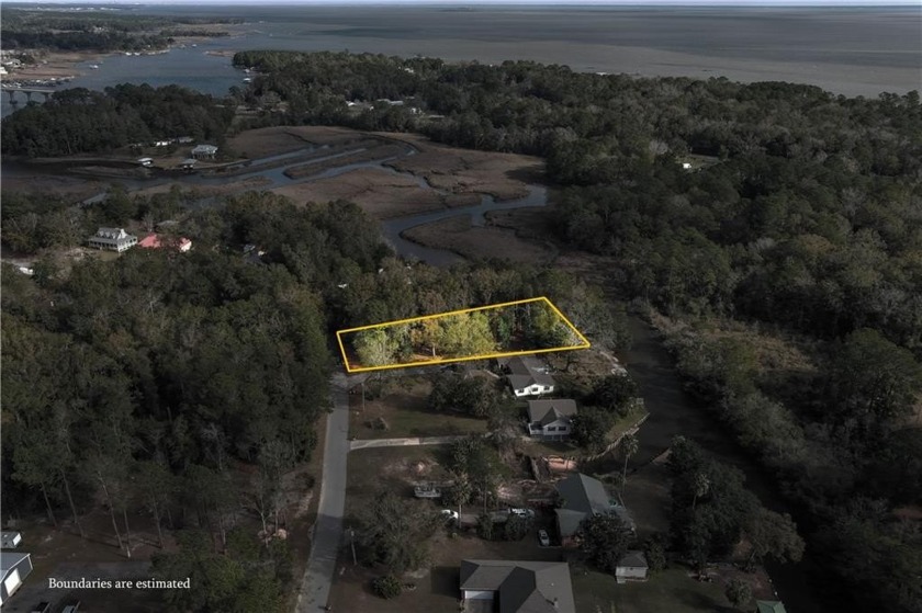 GORGEOUS LEVEL LOT WITH APPROXIMATELY 130 FEET OF WATERFRONT ON - Beach Lot for sale in Coden, Alabama on Beachhouse.com