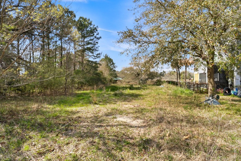 This marsh-front lot offers a rare opportunity to build your - Beach Lot for sale in Charleston, South Carolina on Beachhouse.com