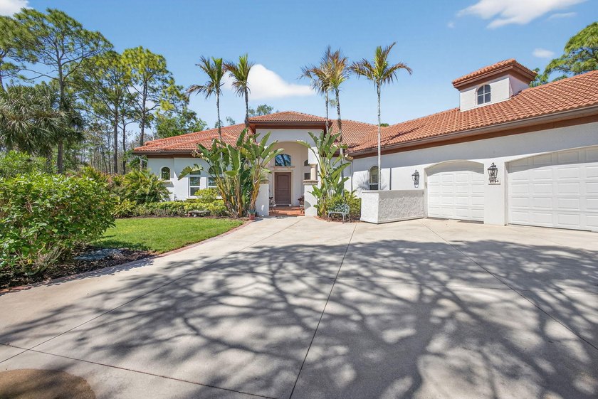 Stunning 4BR, 5BA CBS estate home on nearly one acre of - Beach Home for sale in Jupiter, Florida on Beachhouse.com