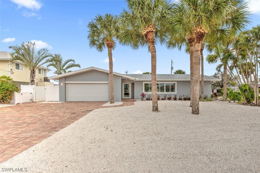 SELLER FINANCING AVAILABLE! Large move in ready 4/3/2 waterfront - Beach Home for sale in Fort Myers Beach, Florida on Beachhouse.com