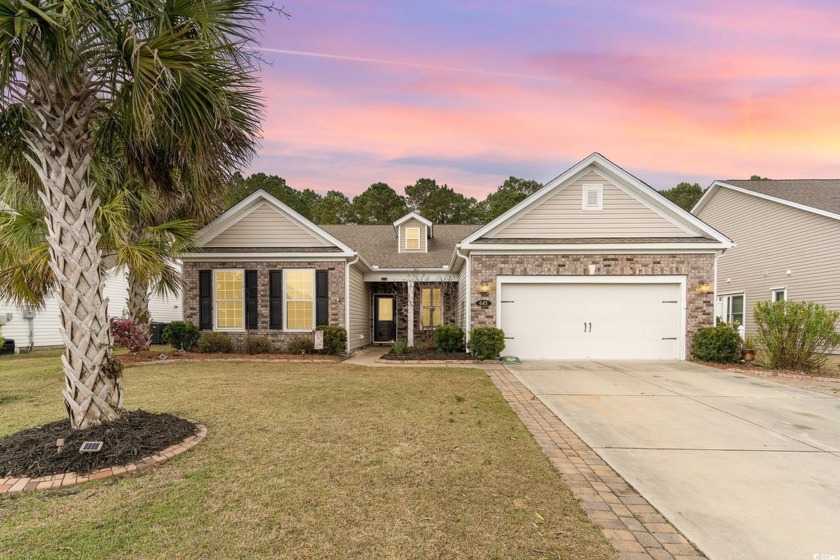 Step into this impeccably maintained 3-bedroom, 2.5-bathroom - Beach Home for sale in Little River, South Carolina on Beachhouse.com