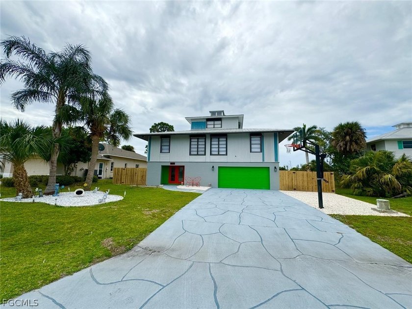 Discover refined living in this exceptional three-story - Beach Home for sale in Bokeelia, Florida on Beachhouse.com