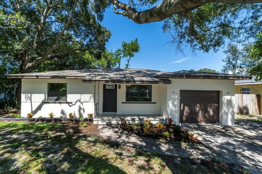 A rare opportunity to own this beautifully updated 3br/2ba and - Beach Home for sale in Clearwater, Florida on Beachhouse.com