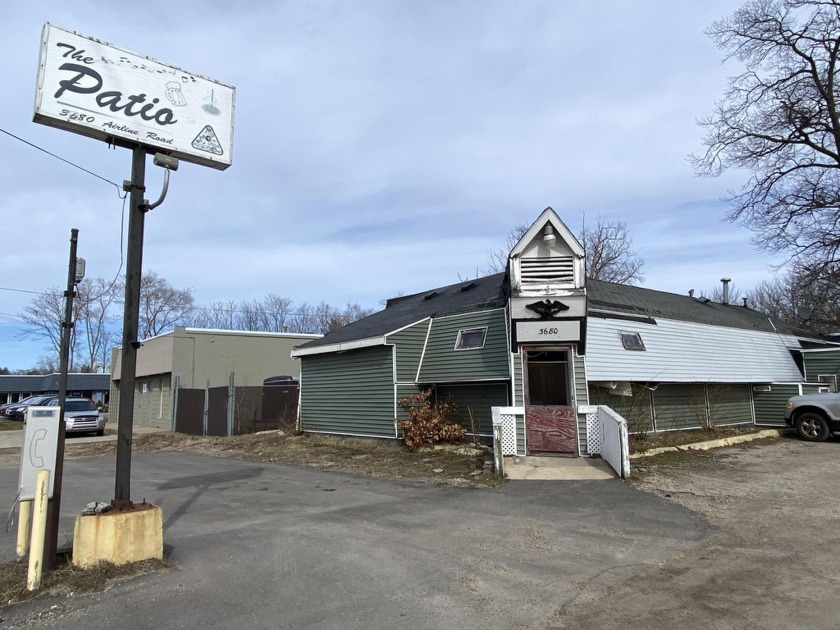 Price Reduced! Seller is motivated to sell this established bar - Beach Commercial for sale in Norton Shores, Michigan on Beachhouse.com