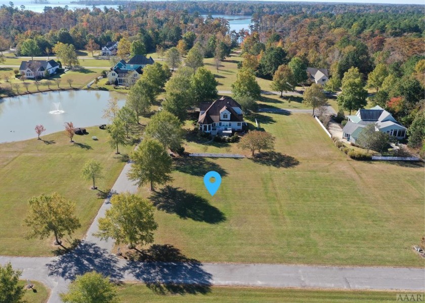 Open corner lot with a view of pond with fountain across the - Beach Lot for sale in Hertford, North Carolina on Beachhouse.com