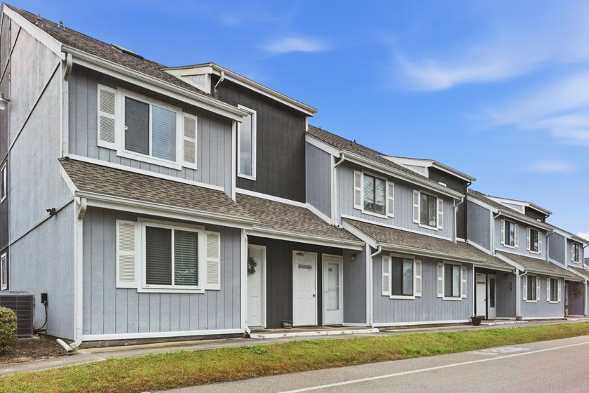 Natural light, soaring ceiling, and short-term rental potential - Beach Condo for sale in Little River, South Carolina on Beachhouse.com