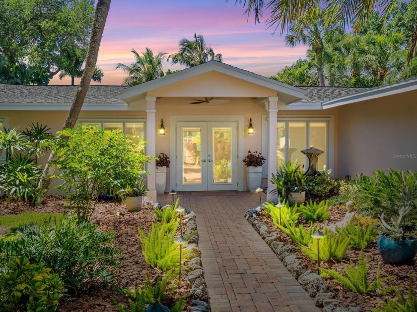 Welcome to your private, gated garden oasis nestled on boating - Beach Home for sale in Sarasota, Florida on Beachhouse.com