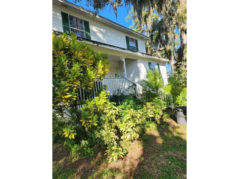 Welcome to this charming home. Set on a corner lot of over a - Beach Home for sale in New Port Richey, Florida on Beachhouse.com