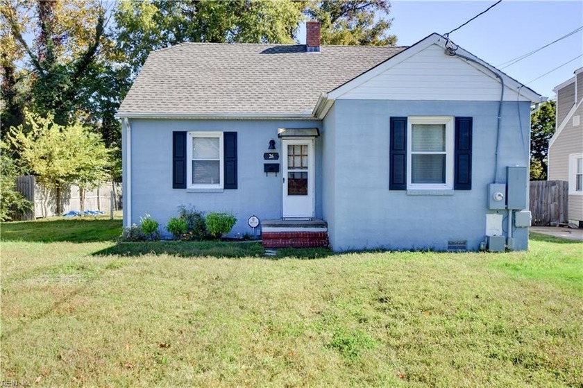 This charming cape cod has a large and open living room with - Beach Home for sale in Hampton, Virginia on Beachhouse.com