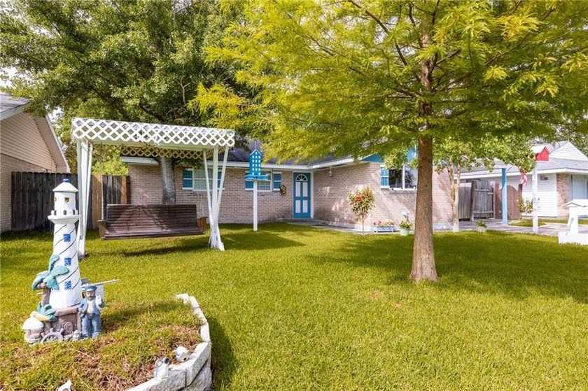 This 4-bedroom 1.5 bath home with an open floor plan is sitting - Beach Home for sale in Slidell, Louisiana on Beachhouse.com