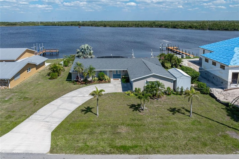 RENOVATED, WATERFRONT HOME IN HARBOUR HEIGHTS ALONG THE PEACE - Beach Home for sale in Punta Gorda, Florida on Beachhouse.com