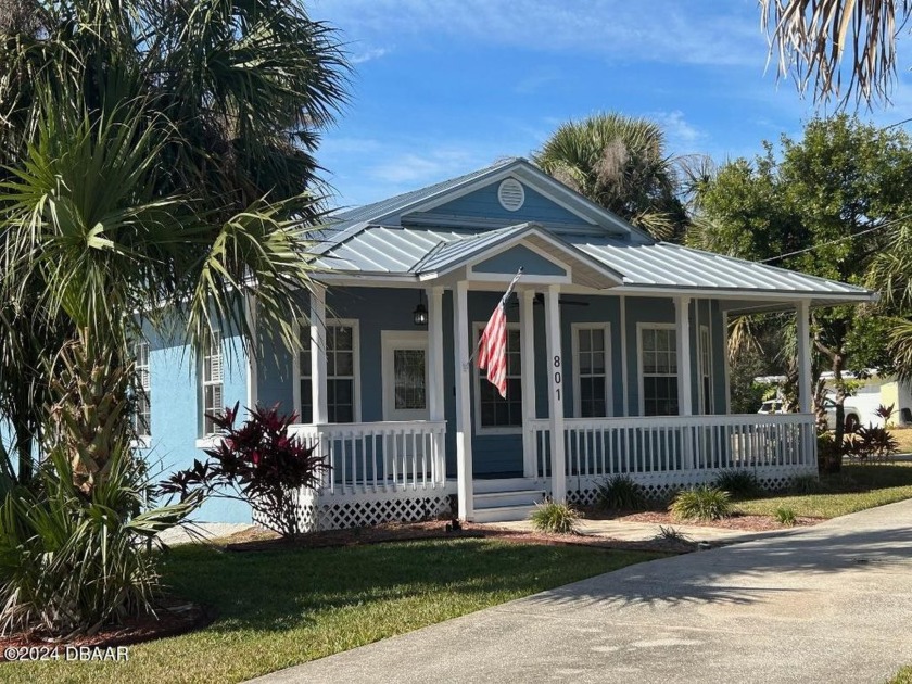 Charming Coastal Key-West-Style Retreat! This unique property - Beach Home for sale in New Smyrna Beach, Florida on Beachhouse.com