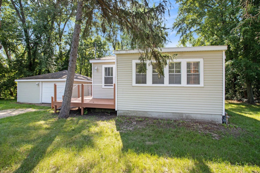A charming updated home is now available for sale, boasting a - Beach Home for sale in New Buffalo, Michigan on Beachhouse.com