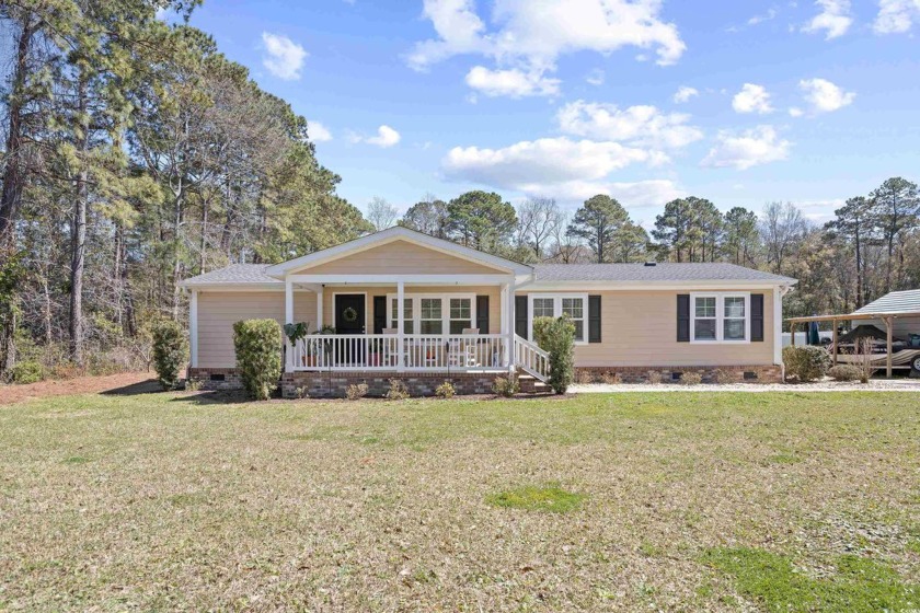 Nestled in the heart of Pawleys Island, this delightful one - Beach Home for sale in Pawleys Island, South Carolina on Beachhouse.com