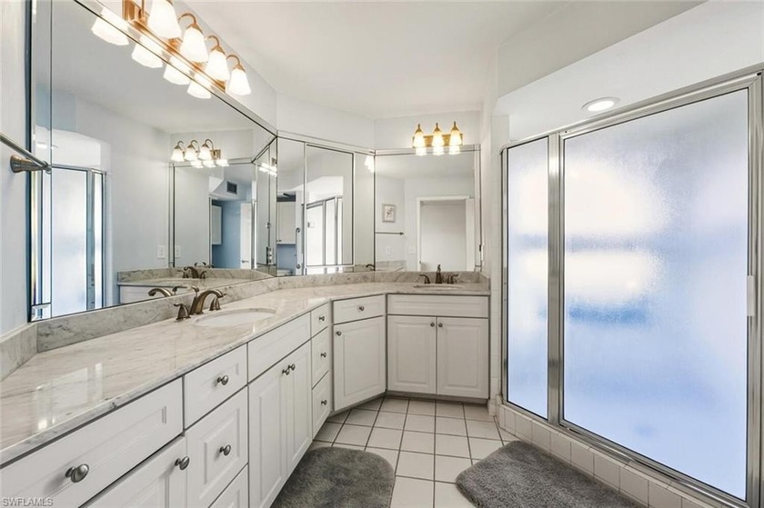 Own a piece of paradise within walking distance to Vanderbilt - Beach Condo for sale in Naples, Florida on Beachhouse.com