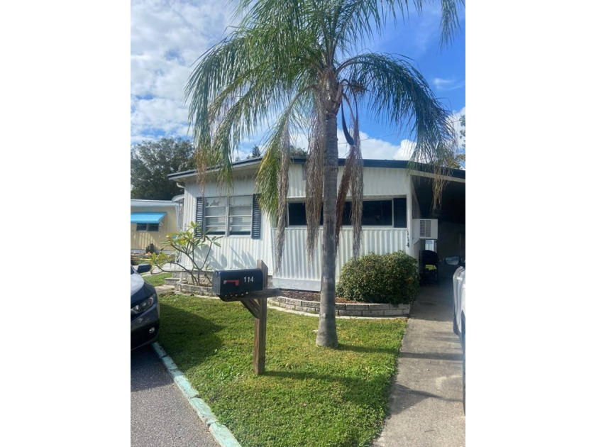 Discover a hidden gem in the peaceful Hillside Community, just a - Beach Home for sale in Clearwater, Florida on Beachhouse.com