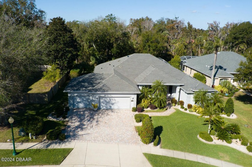 4 Bed 3.5 Bath 3 Car Garage with Massive Lanai showcasing - Beach Home for sale in Port Orange, Florida on Beachhouse.com